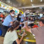 Nicole Seah Instagram - Hammer sale at Kovan 209 market today, in the ward of MP @sylvialim65 . The market was bustling with good food and long queues! Had the pleasure of walking with Marine Parade GRC candidate @fadli_fawzi and seasoned WP veterans. Following which, had to make the best of a precious Sunday by bringing the eldest out for a swim. Wishing all a restful National Day weekend. Kovan 209 Market & Food Centre