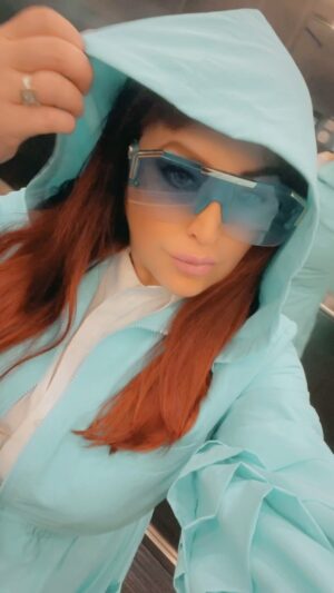 Paige Nicole Mayo Instagram - Living my #Jamiroquai fantasy right now in my @chaouiche trench! 🧥 ☔️ 🎵 #ElevatorTwirl @makingthecuttv 
.
.
Designer: @rchaouiche