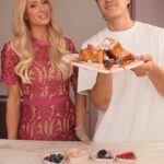 Paris Hilton Instagram - Sliving stuffed French toast with @Owen.Han using my iconic @Walmart cookware collection. 🍞💕 Shop now at the link in my bio! ✨