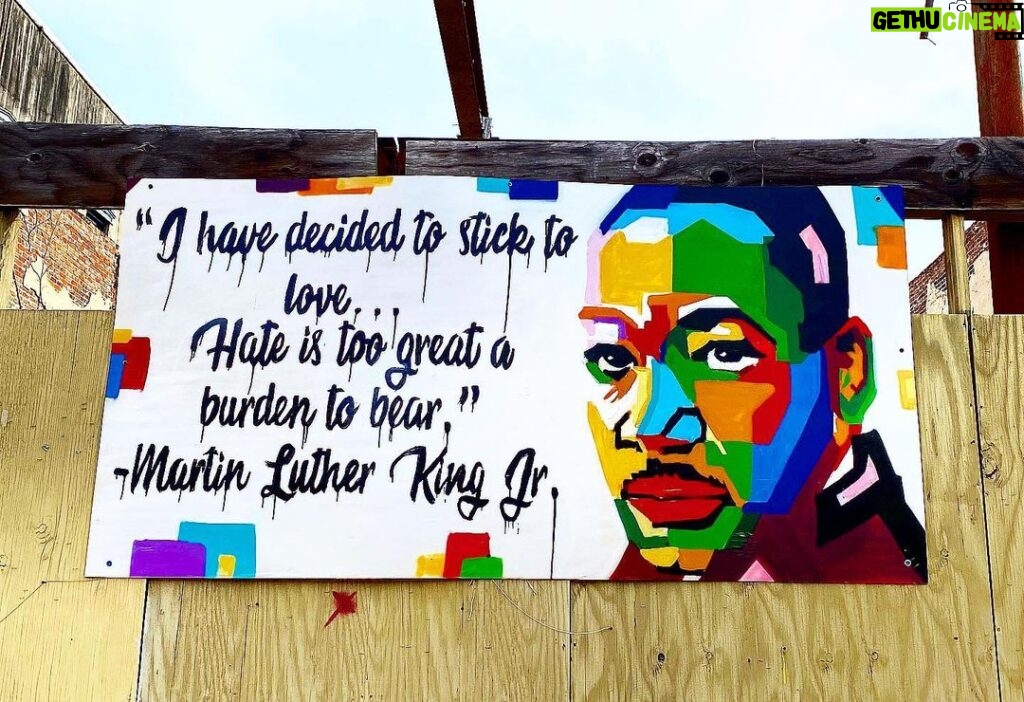 Parisa Fitz-Henley Instagram - “I have decided to stick to love… Hate is too great a burden to bear.” — Martin Luther King 💙💚🤎💛🤍🧡🖤❤️💜 Image: Multicolor painting of MLK on an outdoor wooden wall w/the above quote.