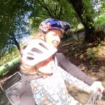 Rachel Atherton Instagram - Daily Adventures with my girl💗💗 they keep us both stoked on life! 👌🥰 Since my i hurt my shoulder again at fort William world champs it’s been a bit tough mentally, another little injury, annoying & frustrating,! I trained so hard after my win in LENZERHEIDE & I had the taste for racing back, but since getting hurt it made me question just how much more I can ask of my body, how much more can I push it & for what?! Its starting to feel good again to just to do things because I enjoy them & not for “training”, riding without a goal, pushing hard up hills whilst arna is asleep in the trailer, then when she wakes up we stop & chill & slow down, it’s a new way to approach life for me but it’s getting more & more enjoyable, just training & exercising for the joy of it without a goal of racing… we will see what happens but I’m forever grateful to the @gopro for capturing all my special memories 🥰🥰🥰🥰🥰 @goprouk #goprohero12 @thule @thule_family @thule_adventure @kidsrideshotgun