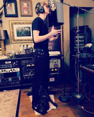 Raine Maida Instagram - Snapped a photo last night while @rowmaida was singing at the mic.  Our dog Stella …if you look to the floor…is a music dog 💯. Something in the vibrations. Ro’s voice. His album is coming along . Songs are stunning. His lyrics . Piano playing etc….Covid does have its silver linings. Weaves through the heartache. The stress. The loss. Family time. discovering parts of us we didn’t know fully existed . creativity resurfacing after being disconnected for years. who knows where it ends but these moments  get me/us through. An old friend used to tell me to always celebrate the little things . see more posts on feeds doing that these days. Appreciating each other a little more. Being present.  in the moment. Thats living. Right?