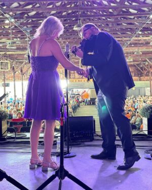 Rhonda Vincent Instagram - We hope you’re fit as a fiddle and joining us tonight at the Pigeon Forge #Bluegrass Festival at the Laconte Center  We’ve got our fiddles tuned up, the shows just started and we’re on at 8. Saturday 9/23 Millington TN - Aquatseli Bluegrass Festival #RhondaVincent & The Rage www.rhondavincent.com
