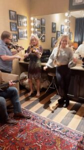 Rhonda Vincent Instagram - 🎄Backstage at the @opry with @rhondavincent ❤️🎻 #fiddle #buckdance #clogging #flatfoot #twinfiddle Grand Ole Opry