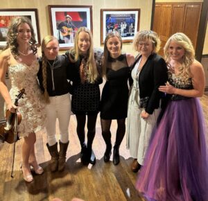 Rhonda Vincent Instagram - Fiddlin’ Females were the focus tonight at the Grand Ole @opry !! These ladies were gathered tonight in celebration of the debut of @eastnashgrass !! Supporting #Bluegrass Music! 10/31/2023