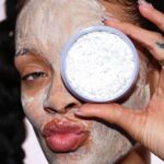 Rihanna Instagram - meet #COOKIESNCLEAN Whipped Clay Detox Face Mask 🧖🏿‍♀️ 😶‍🌫️…. YOUR #1 MOST REQUESTED PRODUCT 👀 Top ingredients: -kaolin clay -charcoal -salicylic acid (BHA) -rhubarb & ginger extracts our FIRST EVER face mask removes dirt, oil, and impurities for deeply cleansed, snatched pores!!! the bouncy, light-as-air texture leaves skin feeling creamy soft and smooth—not stripped like the average clay mask from the opps! #COOKIESNCLEAN drops 4/22 at fentyskin.com