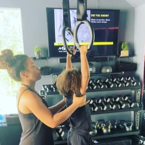 Rockmond Dunbar Instagram - She gets it from her mama! @mayadunbar11 Let’s go with the toes to rings! Berkeley is a lil beast! #garagegym #kids #workout #quarantine #quarantinelife #mydaughter