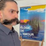 Rouzbeh Rashidi Instagram - So delighted and empowered by the presence of my new wall hanging in my home, the original poster of Jean-Luc Godard's Éloge de l'amour from the 2001 Cannes Film Festival. Living, thinking and making cinema with #Godard every day! Onwards!