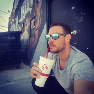 Ryan Merriman Instagram - When shooting on location.....its important to find an Arbys and an alley with some almost banksy as your backdrop #hittinthestreets #boss #keepinitreal 😎 @banksy