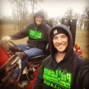 Ryan Merriman Instagram - I come home for a week and pop puts me to work🤣....and no we didn't plan the outfits! #bestdadever #reddirt #tgif #countryboy #goodtimes #carhartt