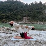 Sakshi Pradhan Instagram – #Balancing amidst the #sacred #energy of the Ganga, I find solace in the #fluid #dance of yoga poses. Each stretch and breath becomes a mindful communion with the river’s #timeless flow, #grounding me in the present #moment . In this sacred space, the union of body and spirit #echoes the harmony of nature, a poignant reminder to be fully present in the #embrace of tranquility. 🧘‍♀️🧘🌊
 #YogaByTheGanga 
#MindfulnessJourney 
#FlowingInHarmony 
#yoga 
#goat
#tranquility 
#Peace Uttarakhand