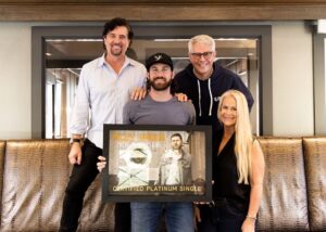 Scott Borchetta Instagram - I love presenting these to our #BMLGfamily! @RileyDuckman's debut single (and first #️⃣1️⃣ at Country radio) was just certified PLATINUM by the @RIAA_awards! 💿

So proud of the impact of "There Was This Girl" and the power of the fans! 👊