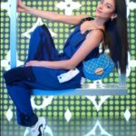 Shay Mitchell Instagram - Thank you @louisvuitton and @nicolasghesquiere for letting me have fun on a giant swing and special shout out to the wonderful crew who pushed it 😂 The LV Remix Collection is Y2K inspired and I am here for it.