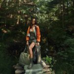 Shay Mitchell Instagram - Introducing the ‘Olive’ green collection. That we shot it in a forest with no olives. Our ‘Olive / Forest Green’ Collection OUT NOW Bowen Island, British Columbia