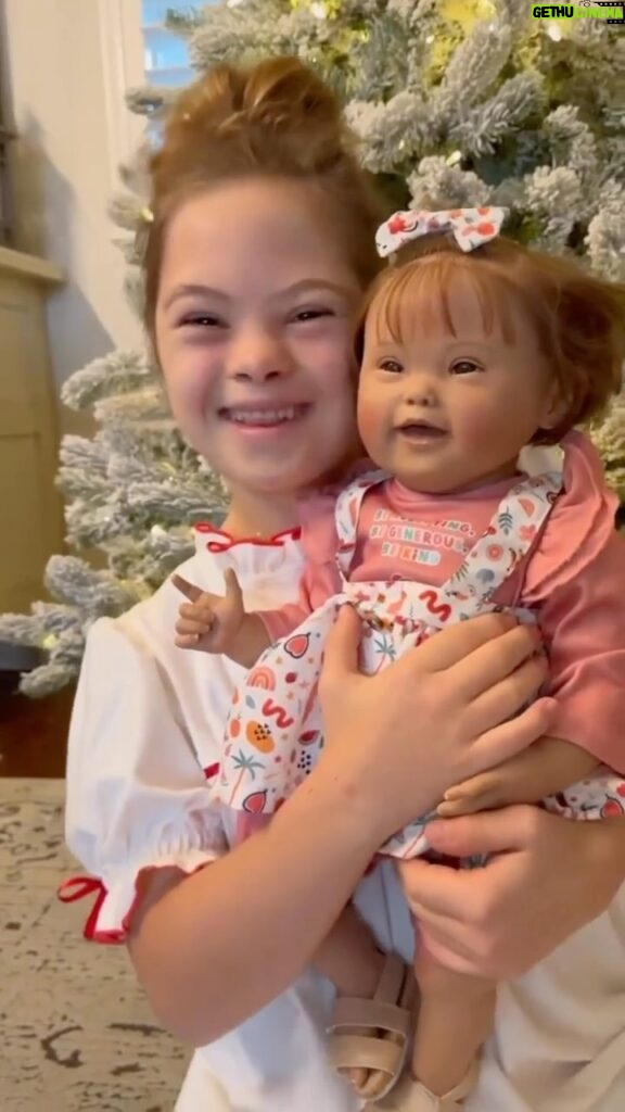 Sofia Sanchez Instagram - Christmas came with a little “extra” magic this year! The most beautiful baby doll with a little something extra. Her name is GiGi and she’s PRECIOUS! Thank you @paradisegalleries for creating a baby doll that captures the rare beauty of Down syndrome. We will cherish her! #nevertooold #underneaththetree #downsyndromeawareness