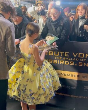 Sofia Sanchez Instagram - World Premiere in Berlin for @thehungergames The Ballad of Songbirds & Snakes 🕊️🐍

I had the time of my life meeting fans, signing autographs and watching the movie for the very first time! It is the most amazing film and I’m so proud! My dress is an homage to the working title of the film “Butterfly” as well as a nod to the butterfly symbol for Down syndrome awareness and my debut as an actress on the big screen. The colors yellow and blue are the colors of DS Awareness and my home country Ukraine. Truly a work of art by the amazing #houseofpetunia 

It was a night I will never forget! #corememory 

Custom Dress & Styling: @dolorispetunia 🦋
Hair & Makeup: @thesanchezsix 💫