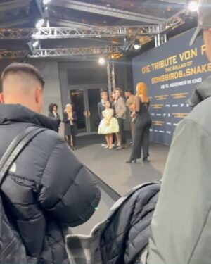 Sofia Sanchez Instagram - World Premiere in Berlin for @thehungergames The Ballad of Songbirds & Snakes 🕊️🐍

I had the time of my life meeting fans, signing autographs and watching the movie for the very first time! It is the most amazing film and I’m so proud! My dress is an homage to the working title of the film “Butterfly” as well as a nod to the butterfly symbol for Down syndrome awareness and my debut as an actress on the big screen. The colors yellow and blue are the colors of DS Awareness and my home country Ukraine. Truly a work of art by the amazing #houseofpetunia 

It was a night I will never forget! #corememory 

Custom Dress & Styling: @dolorispetunia 🦋
Hair & Makeup: @thesanchezsix 💫