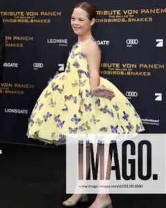 Sofia Sanchez Instagram - World Premiere in Berlin for @thehungergames The Ballad of Songbirds & Snakes 🕊️🐍 I had the time of my life meeting fans, signing autographs and watching the movie for the very first time! It is the most amazing film and I’m so proud! My dress is an homage to the working title of the film “Butterfly” as well as a nod to the butterfly symbol for Down syndrome awareness and my debut as an actress on the big screen. The colors yellow and blue are the colors of DS Awareness and my home country Ukraine. Truly a work of art by the amazing #houseofpetunia It was a night I will never forget! #corememory Custom Dress & Styling: @dolorispetunia 🦋 Hair & Makeup: @thesanchezsix 💫 Upper West Berlin