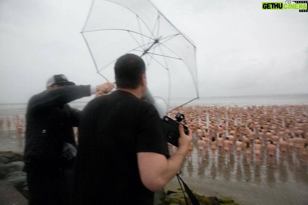 Spencer Tunick Instagram - Dublin in an unexpected storm in 2008. Finished this set up as quickly as possible. Thank you to the participants who braved this one out.