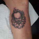 Steffanie Newell Instagram - Mini Pennywise portrait for my friend @nixonnewell we were going to add more stuff but said screw it this is too dope @truetubes @inkeeze @allegoryink #pennywise #horrormovies #horror #horrorart #femaletattooer #femaletattooist #femaletattooartist #ladytattooartist #microportrait #it #pennywisetheclown #stephenking #weallfloatdownhere #scarymovies #darkart #horrorportrait #pennywisetattoo #orlandotattooartists #orlandotattooartist #blackworktattoo #blackworkerssubmission #blackworkers #blackworktattoos #blackworktatto Thirty Six Black Art Collective