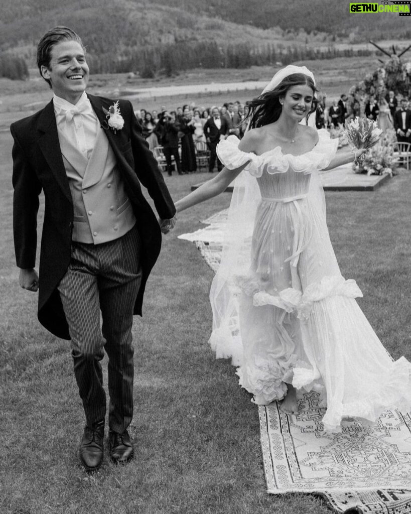 Taylor Hill Instagram - @taylor_hill and Daniel Fryer are married! The couple worked with Hanna Peterson of @table6productions to plan their wedding weekend, held at Devil’s Thumb Ranch in Colorado. “As much as I travel for work—I have literally been [going] non-stop since the age of 14—Colorado has always been my constant, my rock, my home, and my heart. That is until I met Danny. Danny makes me feel home wherever we are. I wanted to share this once-in-a-lifetime moment with all our loved ones in my constant, favorite place, Winter Park, Colorado,” shares the bride. Tap the link in our bio to see exclusive photos from the couple's Western-inspired wedding. Photos: @cedarandpines