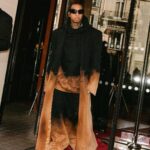 Tyga Instagram - When she got w u it was out of spite, I’m the black Superman u my kryptonite…married to the money throwin hunids like rice..