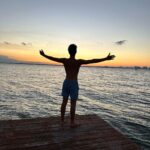 Vincent Michael Webb Instagram - Waiting for the sun to set over the lagoon in Cancun … @vincentwebb.official #sunsetlover #cancunlife #cancunmexico #teenactor #goldenhour #docklife #vivalavida #vincentwebb #vincentcancun Cancún México