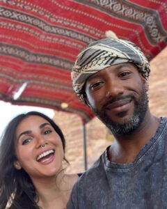 Yasmine Aker Instagram - The greatest form of peace and joy in a relationship is when you feel you don't have to do anything for your partner to love you. A relationship where who you are is 'enough.’ I’ve been feeling not enough lately. I’ve been emotionally drained, physically exhausted and truthfully, showing signs of depression: low energy, irritable, not able to get out of bed in the mornings, not able to remember simple things, not feeling joy from activities I used to feel joy from, not interested in physical activity, and feeling helpless and disconnected from my body. The Iranian revolution has put many Iranians in a state of fight/flight, and I think somewhere in the midst of all the sadness I went from fight/flight to a disassociated freeze mode and stayed there. I’ve been able to fake it in public but behind closed doors, I’ve been unable to be my jovial, silly, energetic self. As a result, I’ve felt deep guilt and shame for not being able to be the usual me. In childhood I learned I had to “earn my keep” in relationships by doing good things, being fun or funny, performing, or being helpful. My current state has shaken my confidence and sense of value. I feel like I’m not as valuable or “enough” for those around me. I feel like I have very little to offer because I’m completely depleted - I feel like an old car salesman who promised a Ferrari to my partner and friends and instead gave them a run down jalopy car. This has triggered deep shame and guilt. I finally admitted this to my partner and how I feel like a burden. I broke down, cried, and shared my feelings. And my partner explained that his love for me is not predicated on my mental health or performance and he wouldn’t leave in the absence of the happier version of me. I realized, just because we’re in a healthy relationship and have done ‘the work’ to heal old wounds doesn’t mean those wounds will not present themselves in new ways. I’m deeply grateful to not have to do anything for my partner’s love in this chapter of life. He is reminding me that I’m enough even if I’m needing to find my way back to myself again. Life is just one long journey back to self again and again. Thank you @prince_nova_