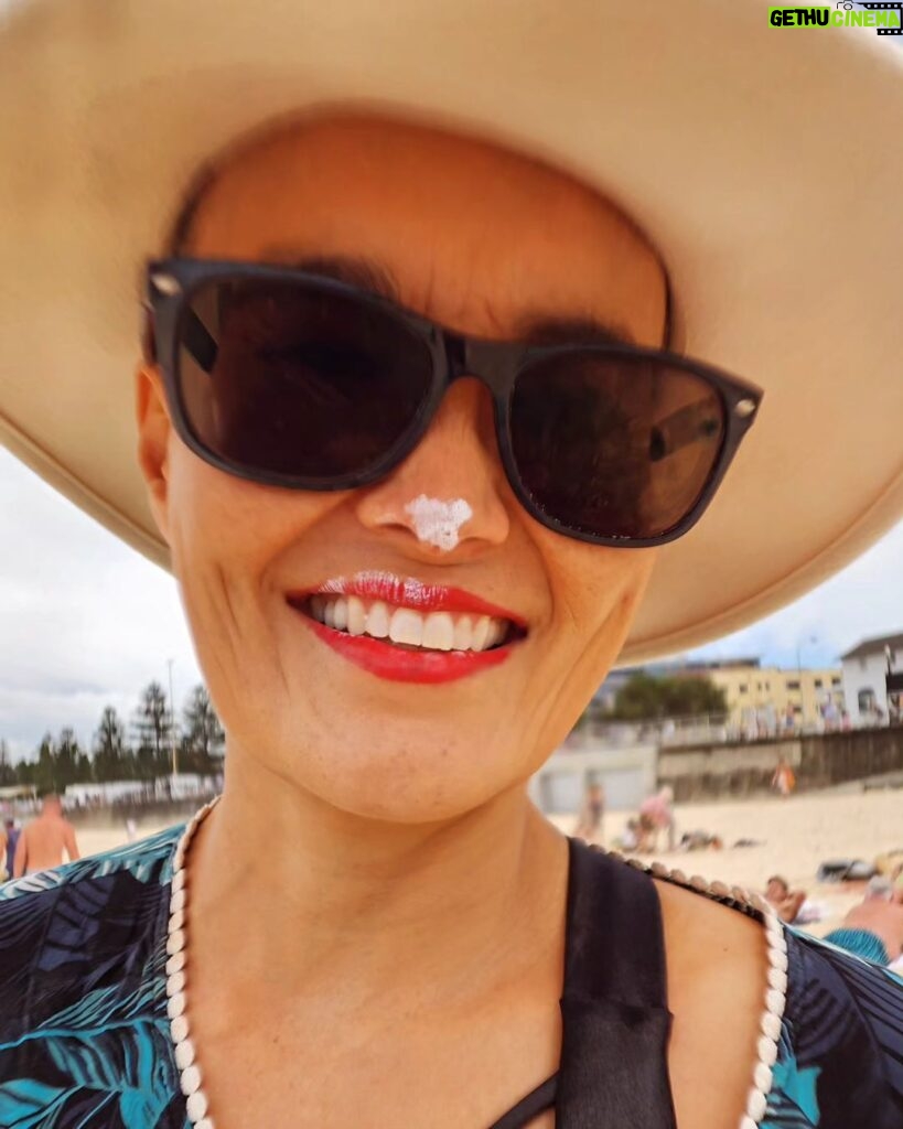 Yumi Stynes Instagram - No one ever takes photos of me. Today at the beach I kissed my kid right after I'd put zinc on her face. "Do I look funny?" I said. "Let me take a photo of you," she said.