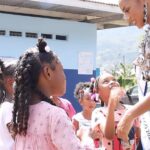 Aché Abrahams Instagram - I’ll never forget the full circle moment of going back to my primary school and having all these little cuties run up to hug me and how excited they were to know that I went to that same school🥹. Also getting the chance to share about my passion for mental health and my project @invisiblescarsproject_mwtt to the students in front of my own past teachers was so surreal and definitely a moment to remember for life🙏🏽. Increasing mental health literacy is key to destigmatising the topic and ensuring no one ever has to struggle in silence💚