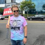 Adam Conover Instagram - RESTOCK!! 100% of the proceeds from these 🌈TIE-DYE🎨 strike shirts benefit @alifeinthearts, and will go to support workers affected by the strike!! The last batch sold out in hours and raised $6000!! This is LAST run we’re doing. Designed by @_ericoverton_ and HAND-PRINTED by my favorite LGBTQ-owned screenprinter, @transfigureprintco. Tap to buy, and brighten up the picket line and support entertainment workers!! Netflix