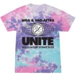 Adam Conover Instagram - I wanted something 🌈 colorful 🎨 to wear to the picket line, so I was overjoyed when my favorite queer-owned screenprinter, @transfigureprintco, was down to make these shirts to benefit the Entertainment Community Fund. Designed by the amazing @_ericoverton_, ALL proceeds from this shirt will benefit @alifeinthearts and support film & TV workers in need! Tap to buy, and see you on the line! 🪧
