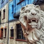 Ahmet Kürşat Öçalan Instagram - a #lion #statue & #hundertwasser #building in #vienna_city #vienna #wien #austria #beautifuldestinations