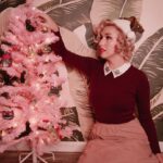 Aimee La Joie Instagram - Meowy Christmas!!! Risked life and limb to get Lydia in some photos with me 🎄 #aimeelajoie #catsofinstagram #vintagechristmas