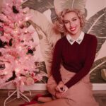 Aimee La Joie Instagram - Meowy Christmas!!! Risked life and limb to get Lydia in some photos with me 🎄 #aimeelajoie #catsofinstagram #vintagechristmas