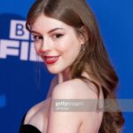 Amelia Gething Instagram - Taken before I got so pissed that I could barely walk 🥂 • Thank you so much @bifa_film for letting me attend my first ever film awards ceremony, and to actually be nominated was so exciting! I feel very honoured (& hungover) and I’m very proud of ‘Emily’ for receiving 4 nominations! • 💇🏼‍♀️💄 - @nadiaaltinbas @diorbeauty 👗💍 - @dior