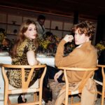 Amelia Gething Instagram - Thank you so much @dior for a lovely Christmas dinner 🤎 I’ll never fir-get this tree-mendous evening! 🎄☃️🧣 Claridge’s