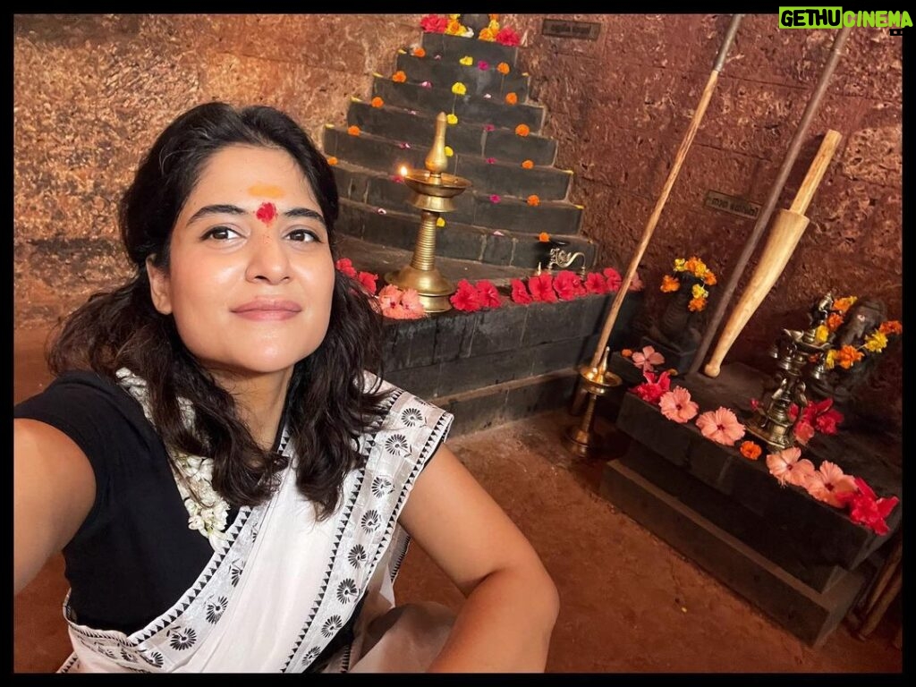 Anshul Chauhan Instagram - I feel extremely blessed that I as an artist, am able to experience and be at such sacred, magnificent places. It is amazing to see how culturally rich and rooted our South of India is. 🙏♥️ Here I am at @hindustankalarisangam with the incredible Deity Poothara behind me which has these seven steps symbolizing Strength, Patience, Commanding power, Posture, Training, Expression and Sound. (Something that I am personally seeking in life 😇) And on the top sits Shiva-Shakti. 🌺🙏 Hindustan Kalari Sangam
