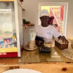 Antonio Dikele Distefano Instagram - Lei è mia madre. Oggi abbiamo finalmente aperto la nostra prima attività insieme in Angola. “Dikele Internet Cafe” è uno spazio ispirato al modello Starbucks dove i ragazzi delle scuole possono studiare, guardare la televisione via cavo e avere accesso a internet di fronte ad un succo e i dolci tipici angolani. Non so se si capisce dalla foto ma mamma è molto felice. Luanda, Angola