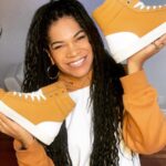Arisa Cox Instagram - *I’M LOOKING FORWARD TO THESE…. this is a pic from like Feb 😭😂* I’m so READY for the summer and getting braids back… and ready to stunt in my favourite custom @tresolz kicks… I have size 11/12 feet (!!!) and if you’re in the same boat and also love glam, THIS is the brand for you… a Canadian Black woman-owned company that will make you feel like a million bucks on a stage or chilling in a park - without the million-buck price tag! And with braided tresses by Tianna from @joujouhair (another Canadian Black woman-owned company)… I mean… that’s a hot girl summer right there 💜 @tresolz @lisawilliamsstyle #braidsbytianna
