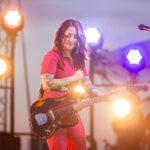 Ashley McBryde Instagram - Gretna Heritage Fest!! Thank you so much for having us and thank you for bringing amazing juju our way. You were incredible! #TheDevilIKnowTour presented by Ariat is rollin’ on and keepin’ the highway hot. Photos by @katiekauss Styled by @blakelyecollier Hair/makeup by @calijeffries @fender @daddarioandco @gretna_fest Gretna, Louisiana