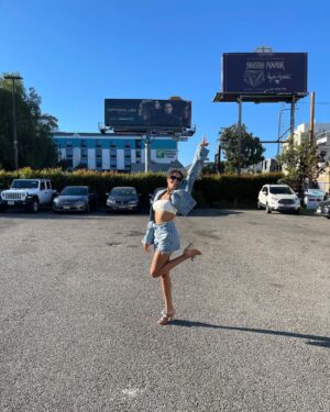 Ashley Nicole Williams Instagram - so I ironically wore the same jean outfit 2 1/2 years ago in front of our first billboard as I did in front of our last. and boy has baby grown. if I could hug that girl and hold her tight, say ya did it kid. 3 seasons as a lead on a tv show. I’m so proud of you. proud of us. cheers to these final episodes, cheers to 4 years of making this show and 3 wildly beautiful seasons, and cheers to leaving a mark on anyone and everyone who loves our show as much as we do. This final season is and always will be for you guys. See u tonight for episode 6. Goddess protect. 🤍 AB