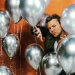 Ashton Irwin Instagram - Peekaboo! I’ll see you at the 5SOS SHOW 2023! I’m hearing the tickets are going fast and some of them are already totally gone. I’ll see you soon everyone. it’s gonna be an excellent summer with you & @5sos Thanks Andy for the cheeky photo @andydeluca Los Angeles, California