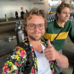 Ashton Irwin Instagram - 28, brushing up on my essential Buddhism , starting to wear the cowboy hat seriously, returning to the social security of a leather jacket & pressure washing at a pretty serious level now. And the last one with the thumbs up at LAX, is a guy who’s just hoping he didn’t get Covid in the airport, ciao!