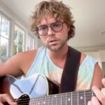 Ashton Irwin Instagram - imagine Elvis in a Tye Dye Shirt? I ❤️ Elvis songs so much, this just floats by like a dream during this 43 degree Celsius day in Australia 🤙🥰 Sydney, Australia