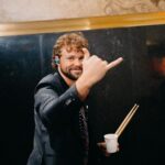 Ashton Irwin Instagram - We have a #1 album in Australia 🇦🇺 god, it still feels like I’m just that kid out in south Windsor, NSW, practicing in the garage. I am so blessed to live this life & thank you so much for listening and loving @5sos Wall Street Bull, New York
