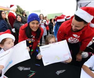 Ayesha Curry Instagram - We celebrated our 11th annual Christmas with the Currys🎄by bringing the joy of reading to all 17,000 elementary school students in the Oakland Unified School District—delivering beautiful gift boxes of books to 49 schools. That’s 85,000 books total!📚 We also made an extra special delivery to 800 students at OUSD's Manzanita Campus, with the help of our village of volunteers and partners. Students received gift boxes of books, backpacks, and other holiday treats. Plus, we announced that Manzanita will be the first of eight @ousdnews campuses to get a revitalized schoolyard in 2024 in partnership with @eatlearnplay and @kaboom! 🎉 Thank you to the dedicated community of partners and volunteers who supported this year’s #ChristmaswiththeCurrys including @workday, @currybrand, @underarmour, @chase, @literatikids, @rakuten, and @warriors. 📷 @noahgphotos/@gettyimages