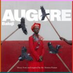 Baloji Tshiani Instagram – MUSIC FROM AND INSPIRED BY THE MOTION PICTURE : AUGURE 
🇫🇷La bande originale du film AUGURE est faite en 4 volets musicaux (EP) écrits et composés du point de vue des 4 personnages principaux du film. C’est un complément, une backstory des personnages et une œuvre musicale à part entière. 
AUGURE est un film choral retraçant l’histoire de quatre personnages considérés comme sorcières et sorciers dans une Afrique fantasmagorique. 
La première mondiale est en sélection officielle du Festival de Cannes, le 22 Mai 2023 prochain.
Le film sortira en salle, en France et en Belgique, en Novembre 2023 (plus d’infos à suivre) 
🇬🇧The soundtrack of the film AUGURE is made in 4 records written and composed from the point of view of the 4 main characters of the film. It is a complementary, a back-story of the characters and a musical piece in his own rights. 
AUGURE is a choral film telling the story of four characters considered as witches and sorcerers in a phantasmagorical Africa. 
The film world première is in the official selection of the Cannes Film Festival, on May 22, 2023.
The film will be released in France and Belgium in November 2023 (more infos to follow) 

Photographer: Kristin Lee Moolman 
AD & style : Baloji 
Assistant photograph : David Clifford Holmes 
Stylist assistant: Eveline Briand 
Set designer : Laure Belkhiri + Emile Nelis-Culot 
Assistant designer: Luciano Basafo
MUA: Claudia Giboia
Brands : Cafe Costume x JJ Van Essche + Elke Hoste 
Flowers collar : Bloomen Van Cornelis 
Photo retouches: Thomas Boyer 
Graphic design : Vrints & Kolsteren
Headpiece : Maitre Chape JC Bolaji
Line Production : Celine Le Provost 
admin : Arnaud Ablaze 
Local Production: Keben for Neo labo 
Location Manager: Charles « Aigle » Kanushipi 
Assistant production : Gabrel Zungawu Ongo 
assistant local production : Aaron Bomolo 
driver : Mwamba tng 💐 thx to @maworldgroup