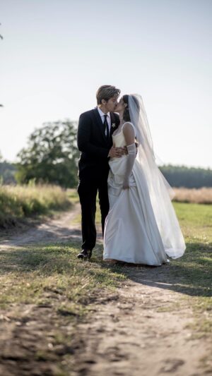 Barbara Palvin Instagram - So thankful to everyone who has supported us over the years. We will never forget the memories we made on this day 🤍

Venue: Harlekin Birtok @harlekinbirtok 
Wedding planner: Anita Palvin @anitapalvin 
Stylist: Marc Eram @marc_eram 
Hair: Owen Gould @owengould 
Hair: Balázs Barsi @barsibali 
Make-up: Richárd Fazekas @ricsesz 
Make-up: Denise Papp @denisebazaar 
Wedding dress: Vivienne Westwood @viviennewestwood 
Wedding suit: Giorgio Armani @giorgioarmani 
Reception dress: custom designed by Lorenzo Serafini at Philosophy @philosophyofficial 
Menyecske ruha / “Menyecske” dress: MERO @peter_mero_official 
Shoes/Bags : Jimmy Choo @jimmychoo 
Jewelry: Tiffany & Co @tiffanyandco 
Cosmetics: Armani Beauty @armanibeauty 
Hair products: Bumble & Bumble @bumbleandbumble 
Creative producer: Bence Bársony, @bencebarsony 
Cinematographer: Márk Székelyhidi, @marksventure 
Cinematographer: Nikosz Hadzisz, @niko.graphy 
Cinematographer: Géza Vadas, @gezavadas 
Editing: Bence Janovits, @janovitsb