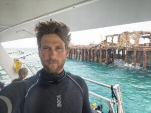 Brad Benedict Instagram - Any kind of structure is likely to be a congregating spot for sea life. Where there are healthy ecosystems, there are sharks! 
.
.
Seen here, SS Sapona was a concrete-hulled cargo steamer that ran aground near Bimini during a hurricane in 1926. The wreck of the ship is easily visible above the water, and is both a navigational landmark for boaters and a popular dive site.
.
.
Catch episode 1 of @sharkweek’s #SharkAcademy tonight on regular #DiscoveryChannel @discovery at 10pm, or binge the whole series on @discoveryplus. 
.
.
#sssapona #bimini #wreckdive #sharkweek #sharks